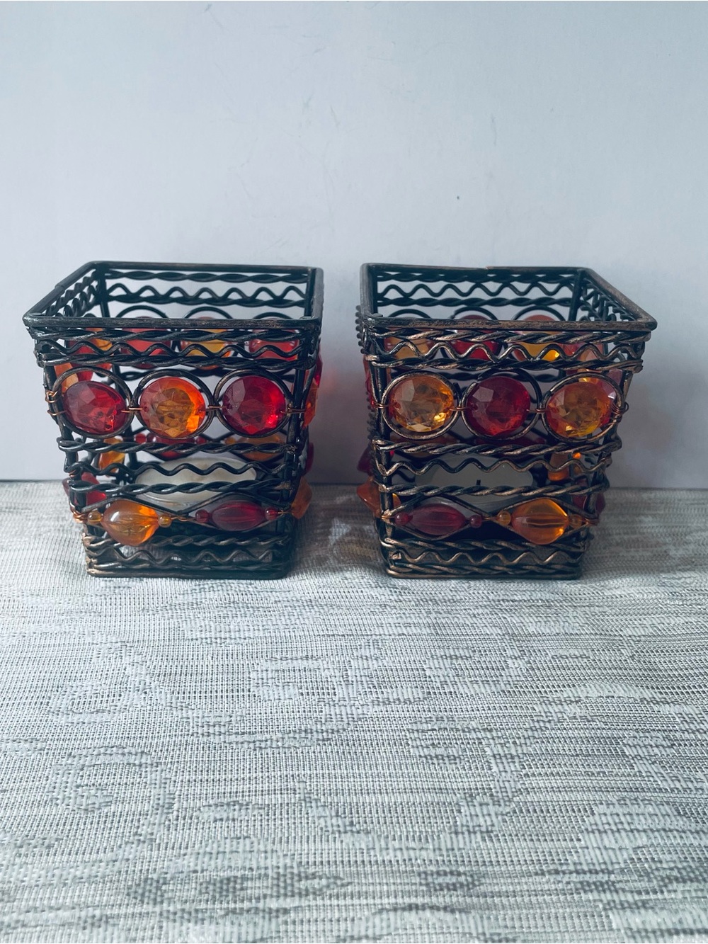 Pair of Home Accents Amber and Red Beaded Metal Votive Holders
